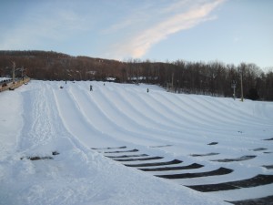 One of the tubing hills at Mountain Creek resort in NJ. It's empty because all the tubers go down at the same time, and they haven't shoved off yet. Copyright Deborah Abrams Kaplan