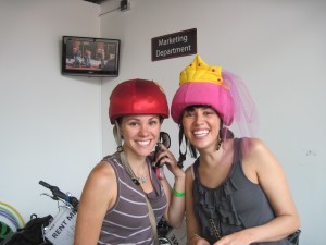 Two cute sisters with their helmets.