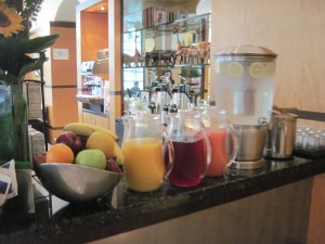 Juices and fruits were part of the complementary breakfast  at Hotel Giraffe. Copyright Deborah Abrams Kaplan 