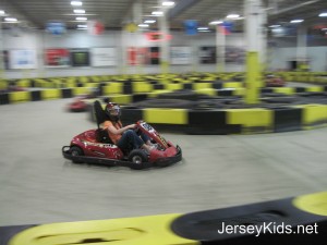 One of the racers rounds the curve at Pole Position Raceway in Jersey City. Copyright Deborah Abrams Kaplan