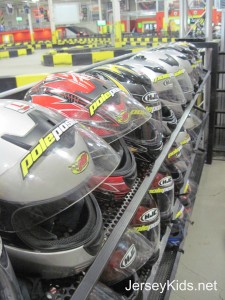 After watching a safety video, you get fitted with helmets at Pole Position Raceway in Jersey City. Copyright Deborah Abrams Kaplan