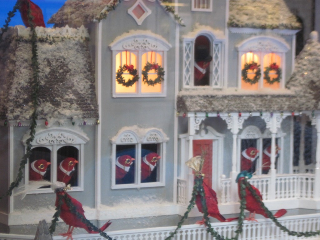 This close-up of one of the mansions from the photo above, shows the cardinals coming out the windows to peek.