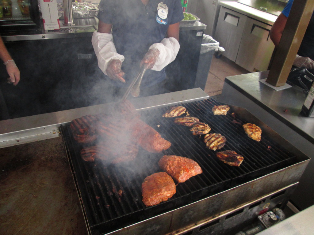 Cooking up the meat at the Cabana Cove Bar and Grill. Photo by Deborah Abrams Kaplan