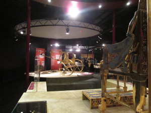 King Tut's golden throne in the foreground, and his ceremonial chariot in the background. Copyright Deborah Abrams Kaplan