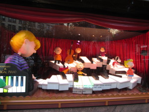 You can help play Linus's piano in this Macy's Peanuts window display. It's not a full set of keys, though, and the sound leaves something to be desired! Copyright Deborah Abrams Kaplan