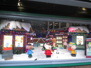 This Macy's Peanuts window display is supposed to let you change Charlie Brown's outfit that he wears in the house, but it wasn't working. Copyright Deborah Abrams Kaplan